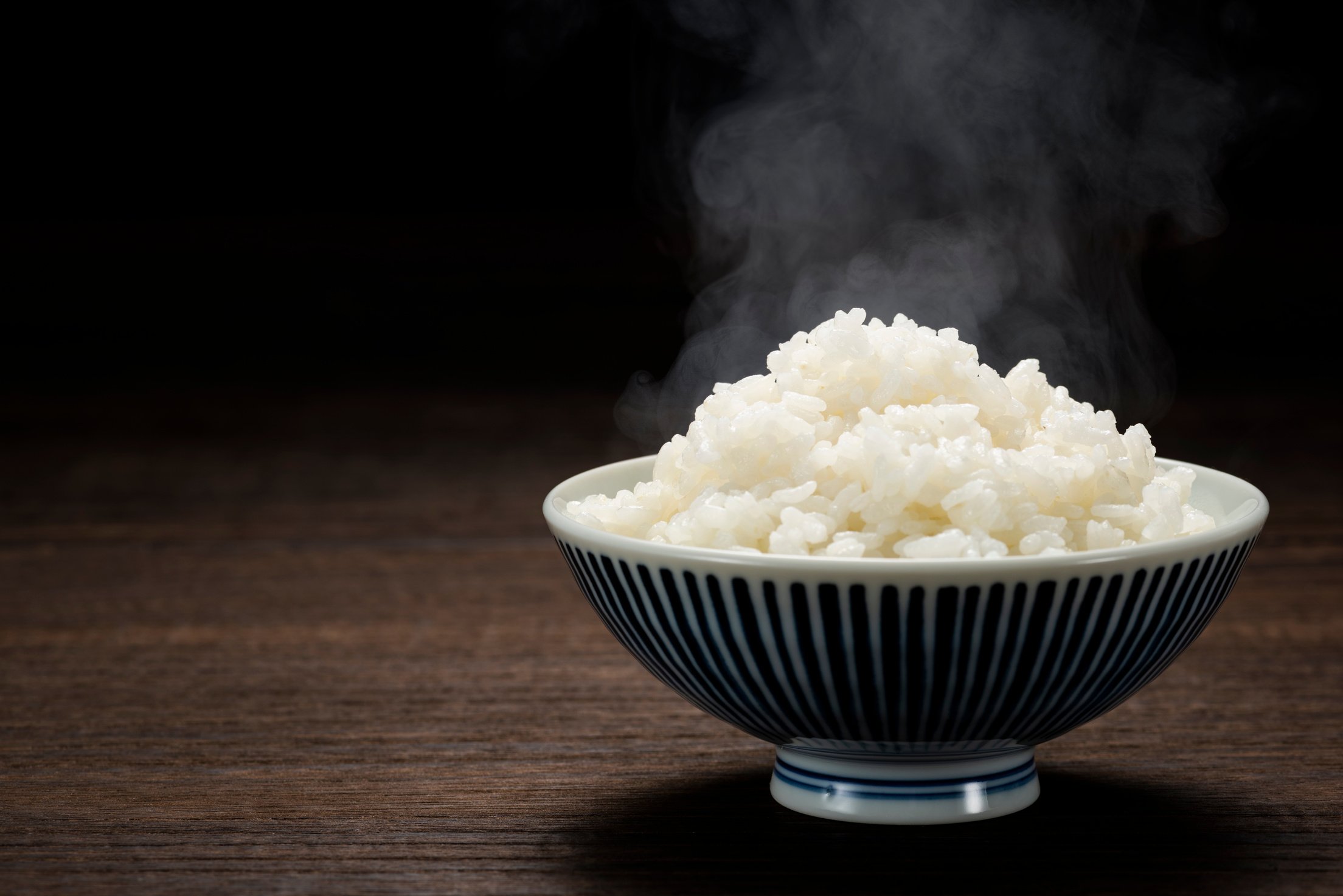 Freshly cooked hot rice, in bowl